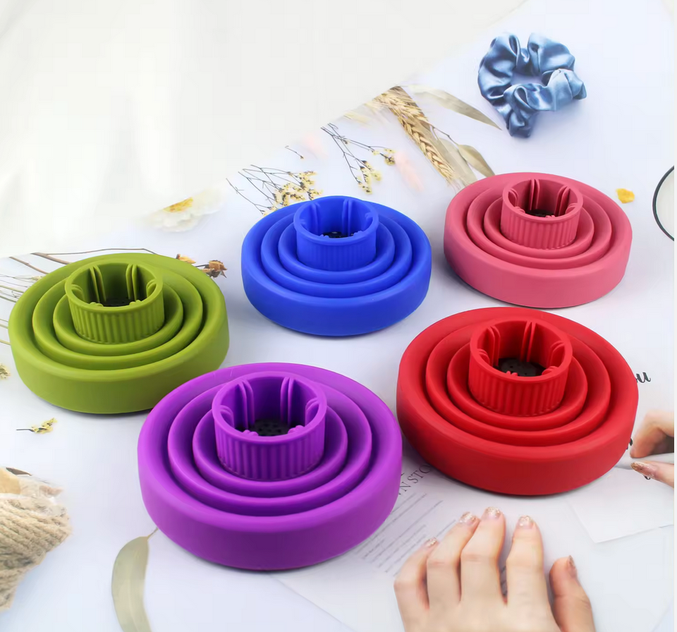 Susiskleidžiantis antgalis-difuzorius